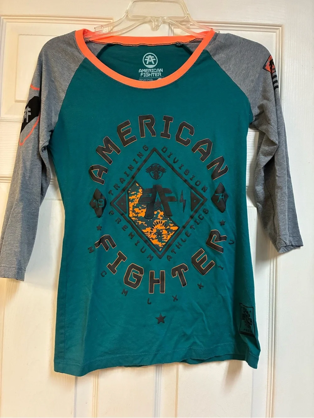 2 American Fighter women’s small/ XS 3/4 Sleeve Raglan Tee’s Teal & Orange